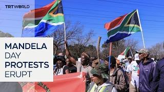 South Africans celebrate Mandela amidst xenophobic protests