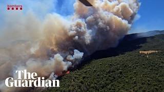 Aerial footage shows wildfire raging across Catalonia