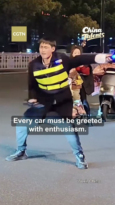 Parking attendant goes viral for turning traffic control into a street dance show