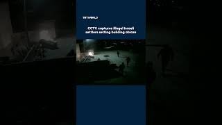 Illegal Israeli settlers setting building ablaze in the occupied West Bank