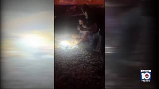 Woman survives after car dragged by Brightline train