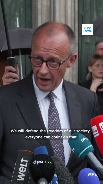 Merz urges Germany to avoid division and intimidation