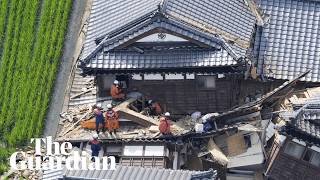 'There are people waiting to be rescued': race under way to find Japan quake survivors