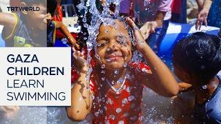 Children in Gaza receive free swimming lessons