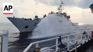 China Coast Guard fires water cannon at Philippines ship in South China Sea