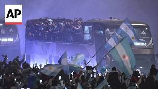 Argentina fans brave cold, rain to welcome national team