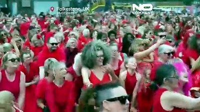 Hundreds dressed in red recreate Kate Bush’s Wuthering Heights dance