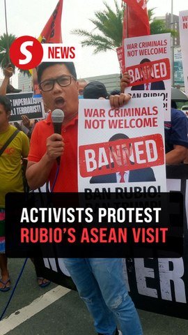 Activists clash with police during ASEAN foreign ministers meeting in Manila