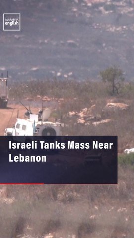Israeli Tanks Mass Near Lebanon