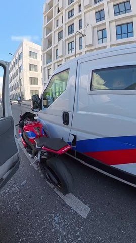 Motorcyclist Crashes Into Vehicle Door After It Suddenly Opens