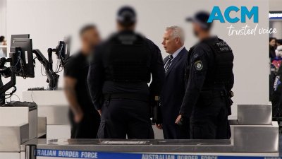 Arrest at airport on eight-year outstanding warrant