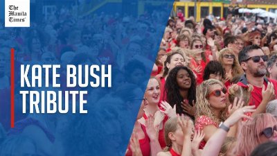 Hundreds of dancers form sea of red on English coast in Kate Bush tribute