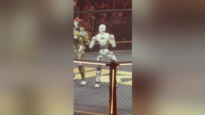 Dancing Robot Taunts Opponent Before Futuristic Fight Begins