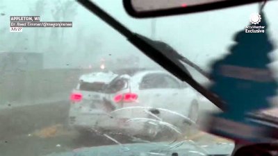 Damage and debris litters Wisconsin highway after destructive tornado